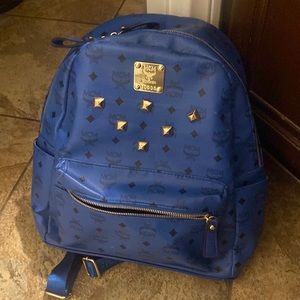 selling MCM backpack color is blue